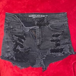 Ripped black American Eagle shorts